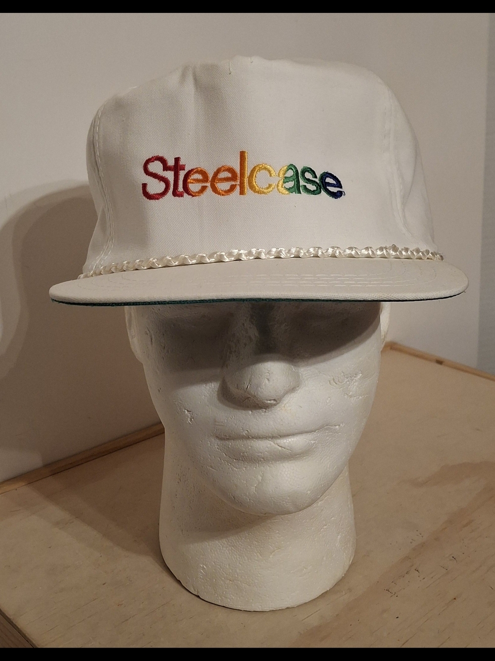 Vtg 90s White Steelcase Derby Cap snapback  rainbow-colored logo, rope detail